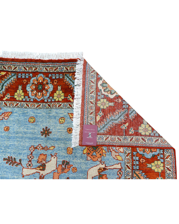 Tappeto Heriz 225x210 cm con motivo tradizionale persiano floreale, dominato da colori blu, rosso e arancio, annodato a mano con lana di alta qualità e ordito in cotone resistente.