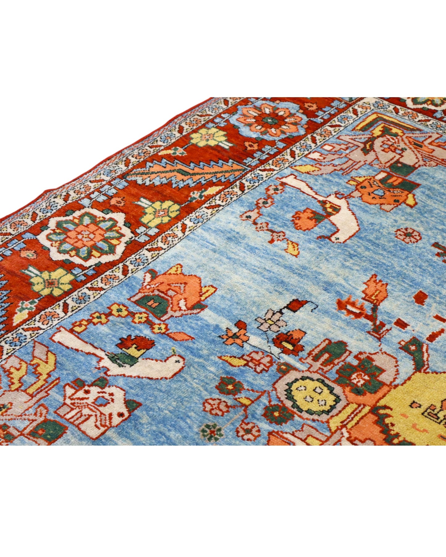 Tappeto Heriz 225x210 cm con motivo tradizionale persiano floreale, dominato da colori blu, rosso e arancio, annodato a mano con lana di alta qualità e ordito in cotone resistente.