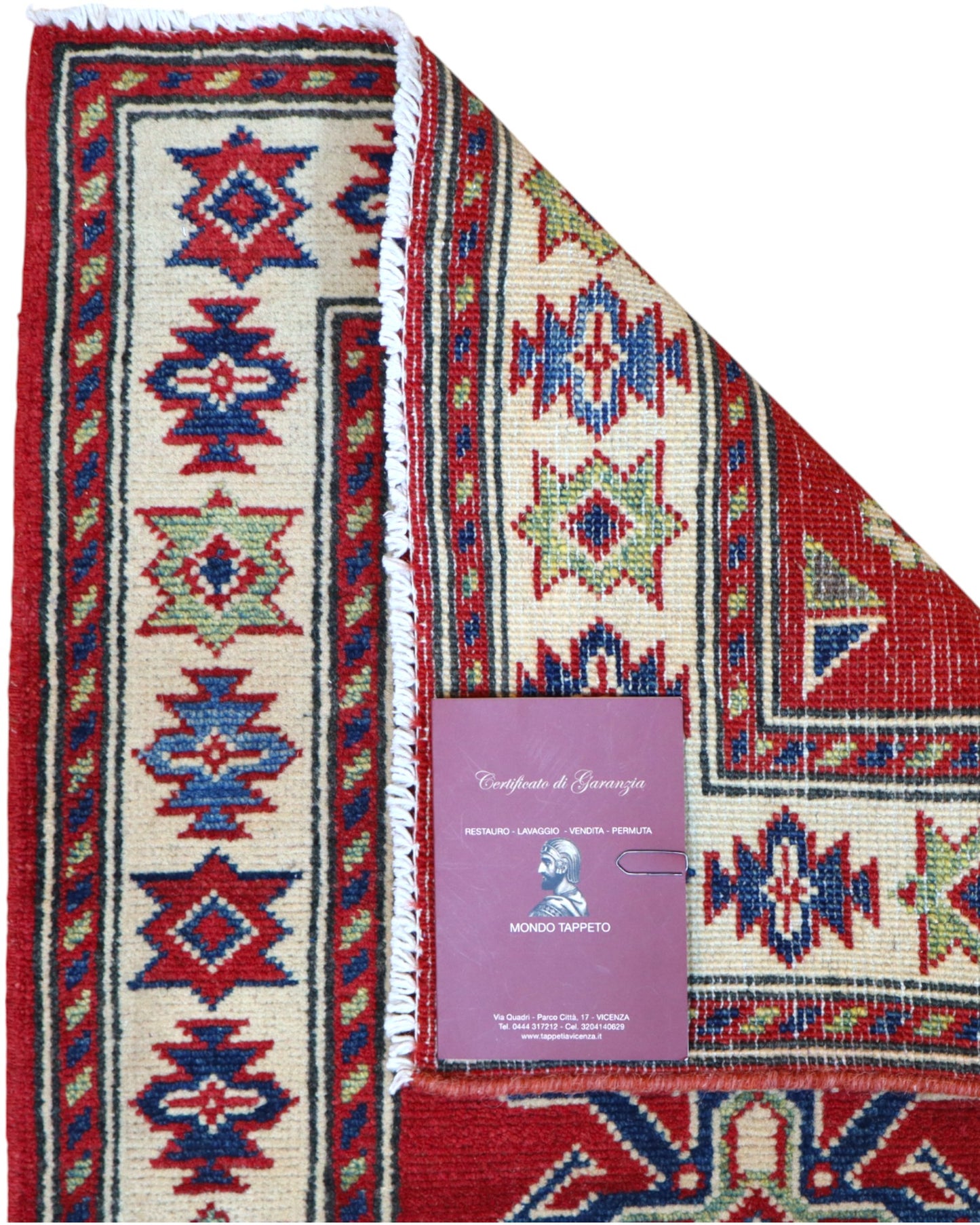 Passatoia Kazak annodata a mano (297x61 cm) in lana, con sfondo rosso melograno e bordo beige, con motivi geometrici afgani.