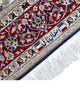 Tappeto Esfahan persiano 162x108 cm, annodato a mano, fondo blu notte con motivi decorativi, vello lana/seta con base in seta, colori vegetali, certificato di autenticità.