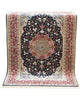 Tappeto Esfahan persiano 162x108 cm, annodato a mano, fondo blu notte con motivi decorativi, vello lana/seta con base in seta, colori vegetali, certificato di autenticità.