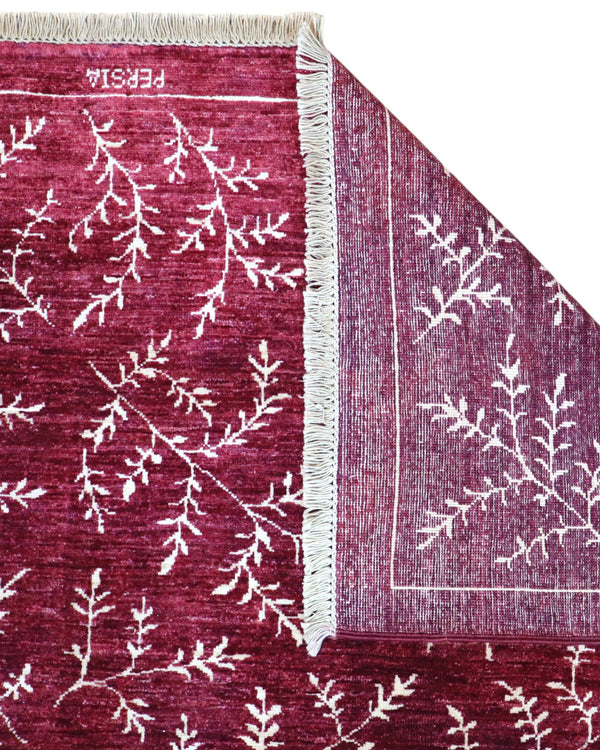 Tappeto moderno 225x178 cm Persia con fondo bordeaux e motivi floreali in avorio, annodato a mano in lana e cotone.
