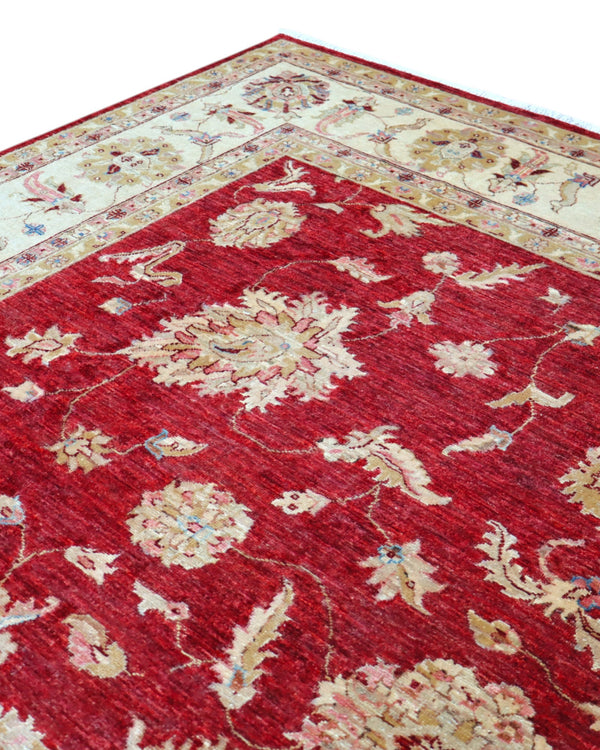 Tappeto Ziegler 302x211 cm con fondo bordeaux, motivi floreali avorio e dettagli oro, tramato ed annodato a mano, provenienza Afghanistan.