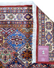 Tappeto Kazak 176x131 cm con motivi geometrici caucasici, colori blu, avorio e rosso, tramato ed annodato a mano.