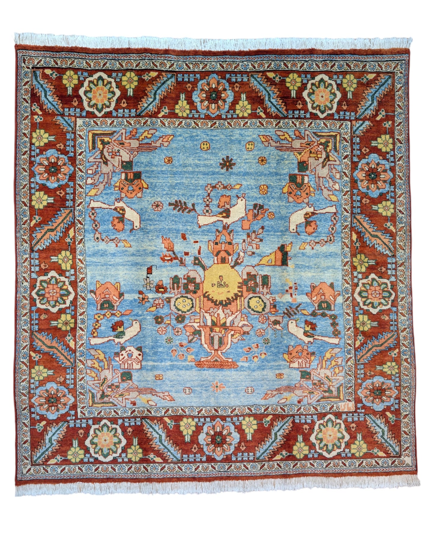 Tappeto Heriz 225x210 cm con motivo tradizionale persiano floreale, dominato da colori blu, rosso e arancio, annodato a mano con lana di alta qualità e ordito in cotone resistente.