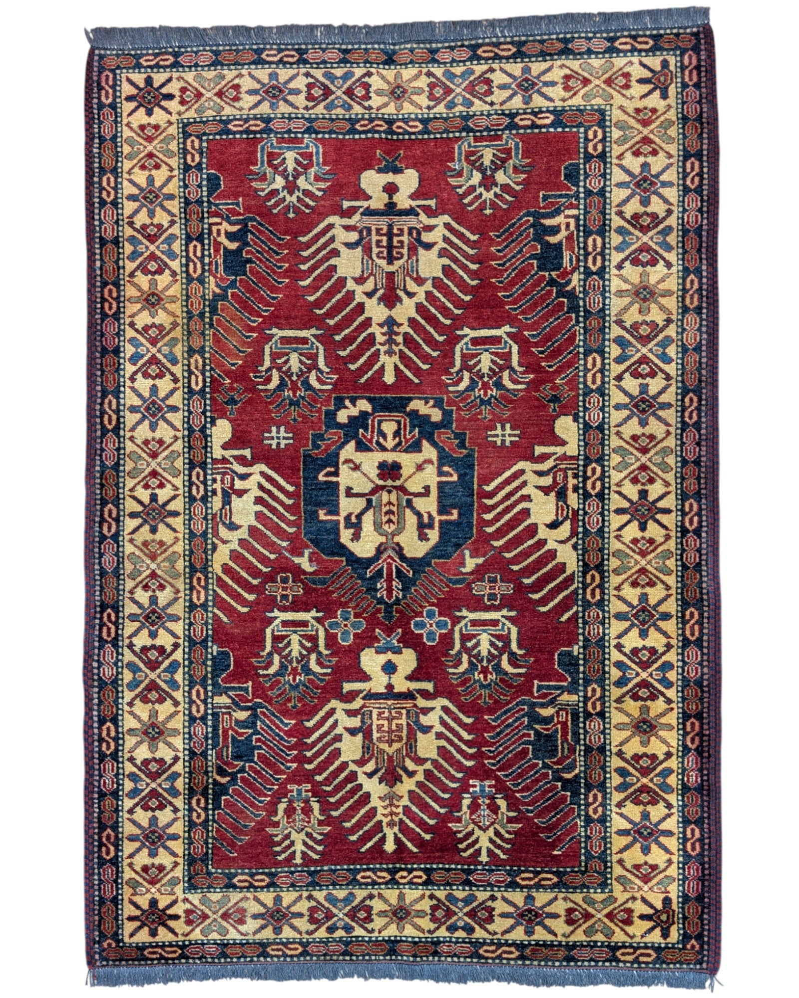 Tappeto Kazak rosso con cornice beige e motivi geometrici, annodato a mano in Afghanistan in lana e cotone con colori vegetali.