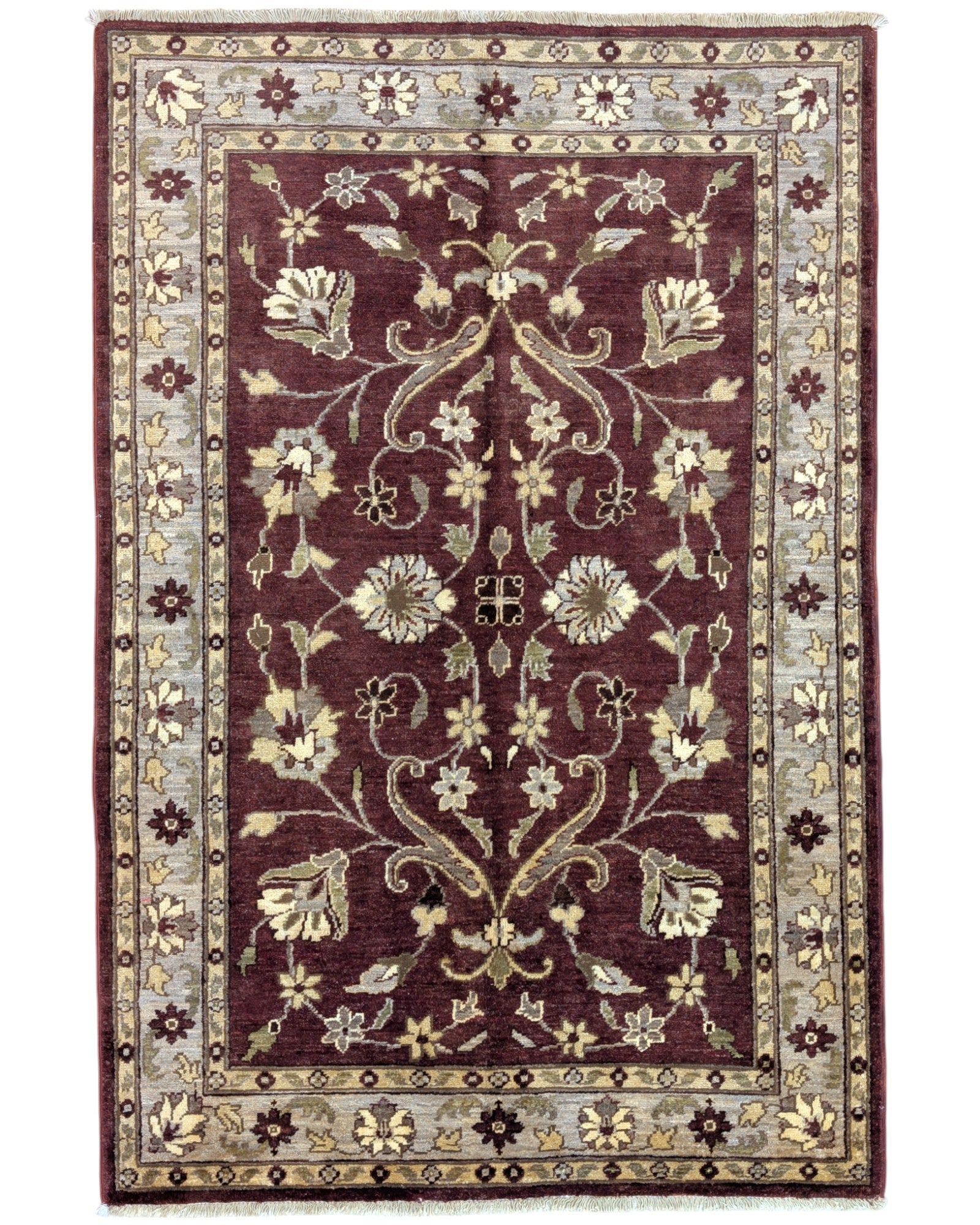 Tappeto Ziegler rosso mattone e beige, annodato a mano in Afghanistan. Realizzato in lana e cotone con colori vegetali, unisce raffinatezza floreale e tradizione artigianale.