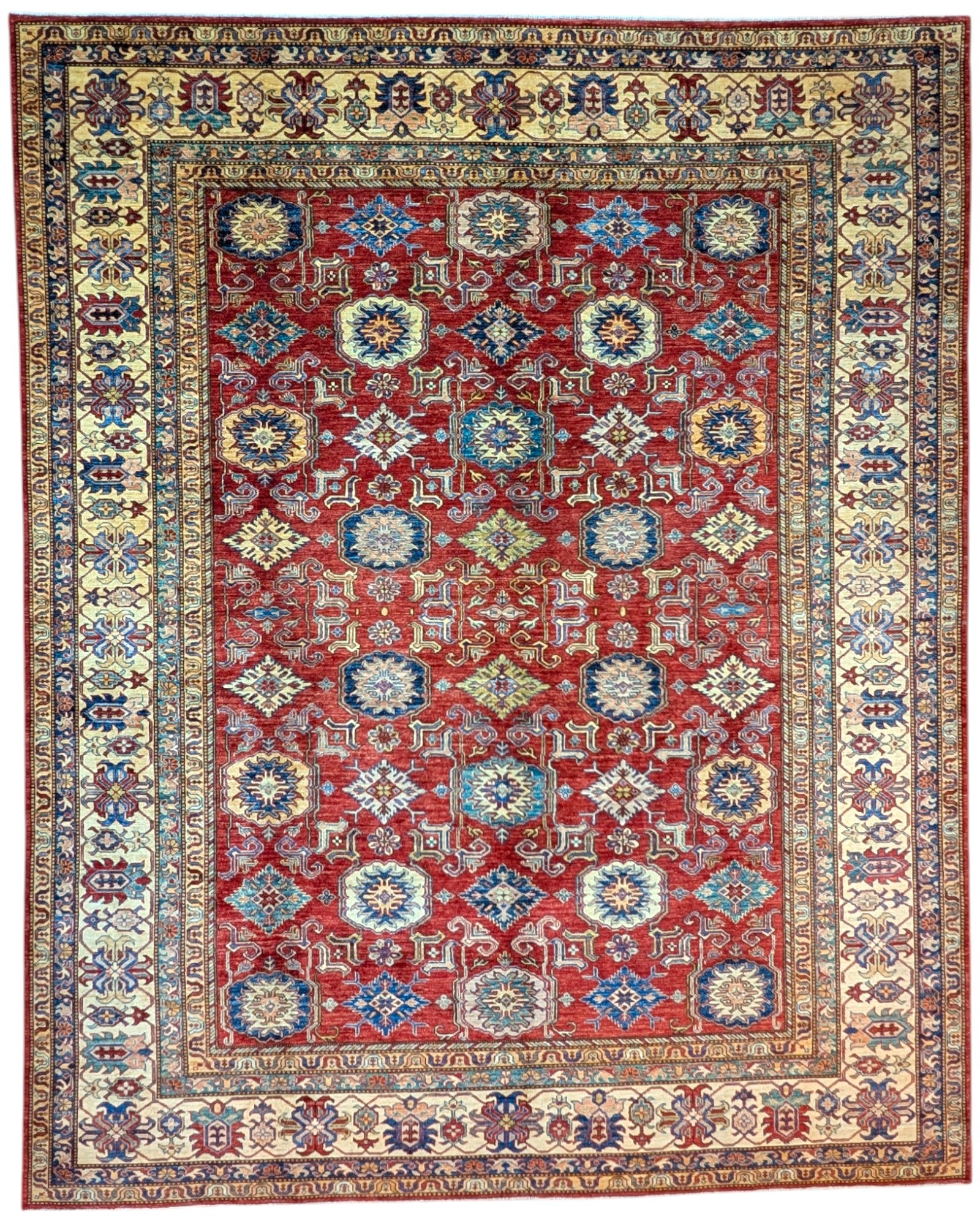 Tappeto Shirvan rosso melograno con cornice beige e motivi geometrici, annodato a mano in Afghanistan con lana e cotone tinti con colori vegetali.