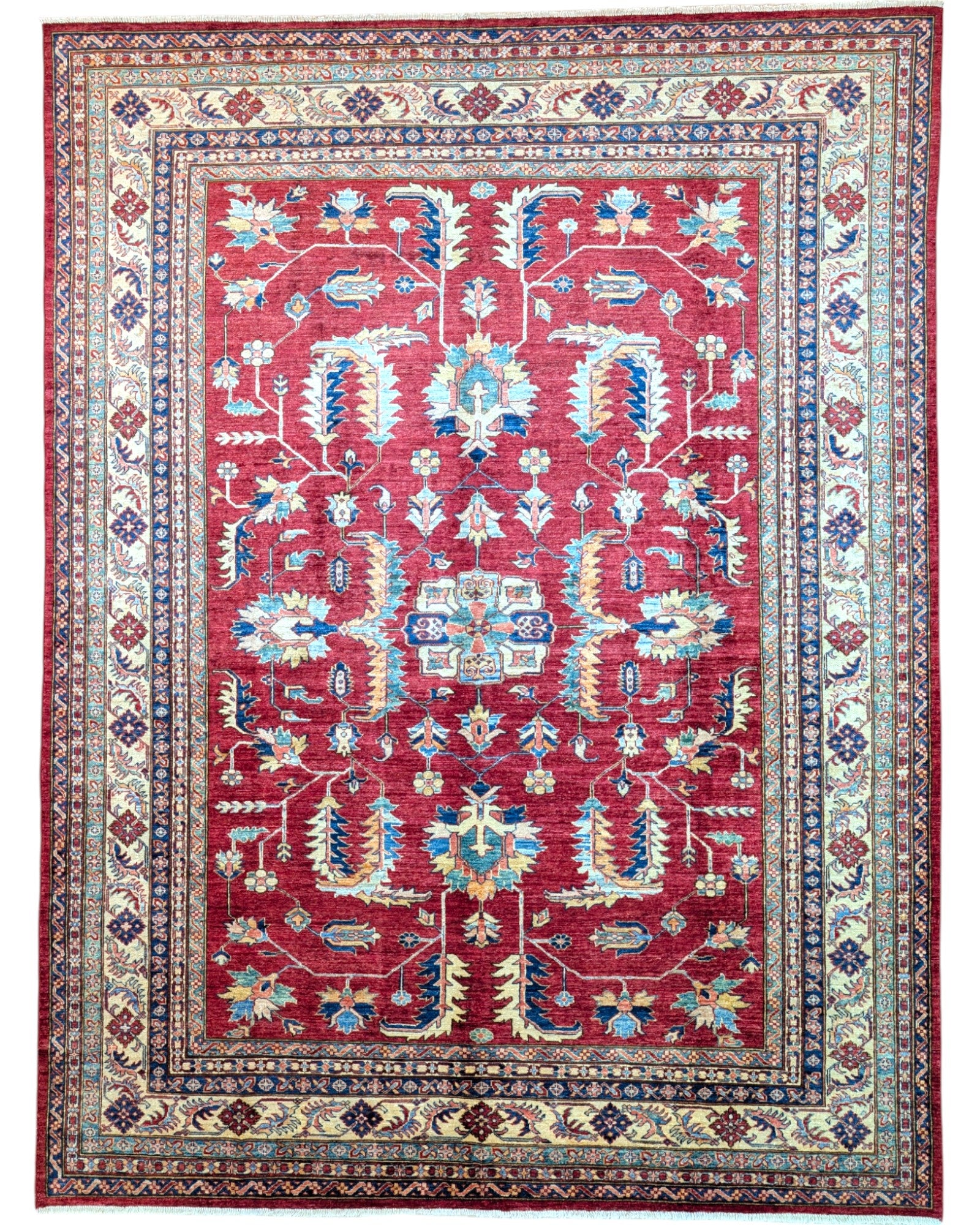 Tappeto Shirvan rosso melograno con cornice beige e motivi geometrici tradizionali, annodato a mano in Afghanistan con lana e cotone tinti con colori vegetali.