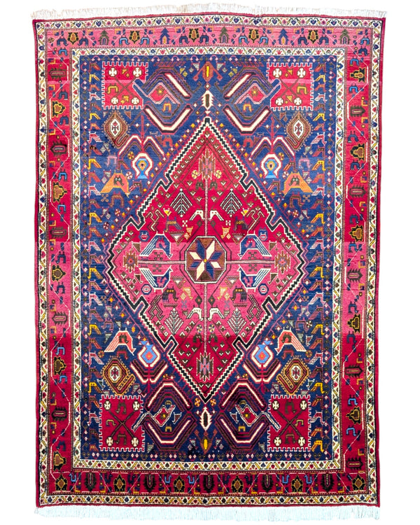 Tappeto Afshar "Pianta di Castello" blu con motivi geometrici ispirati a un castello, annodato a mano in Persia in pura lana tinta con colori vegetali.