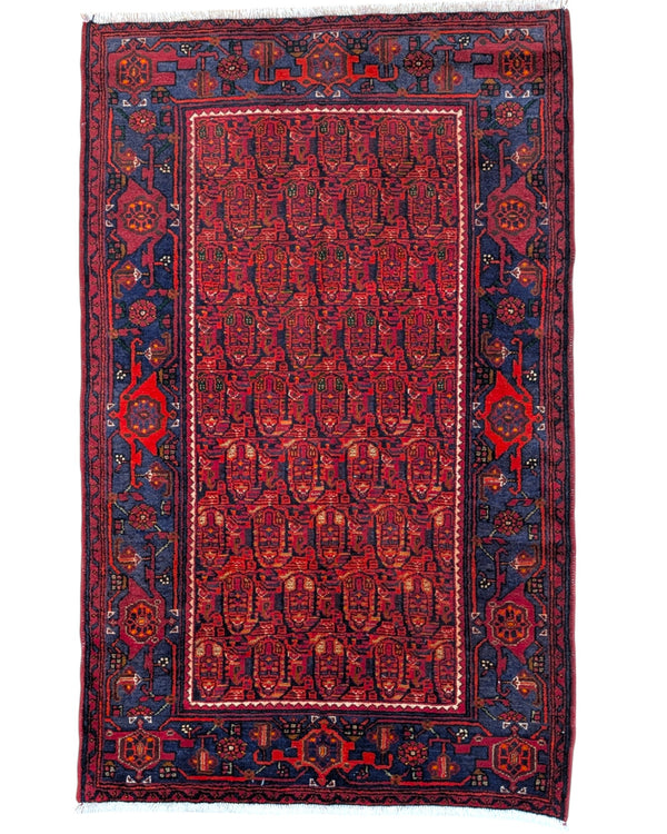 Tappeto Senneh annodato a mano, 214 x 132 cm, fondo rosso intenso, motivi geometrici, artigianato tradizionale persiano.