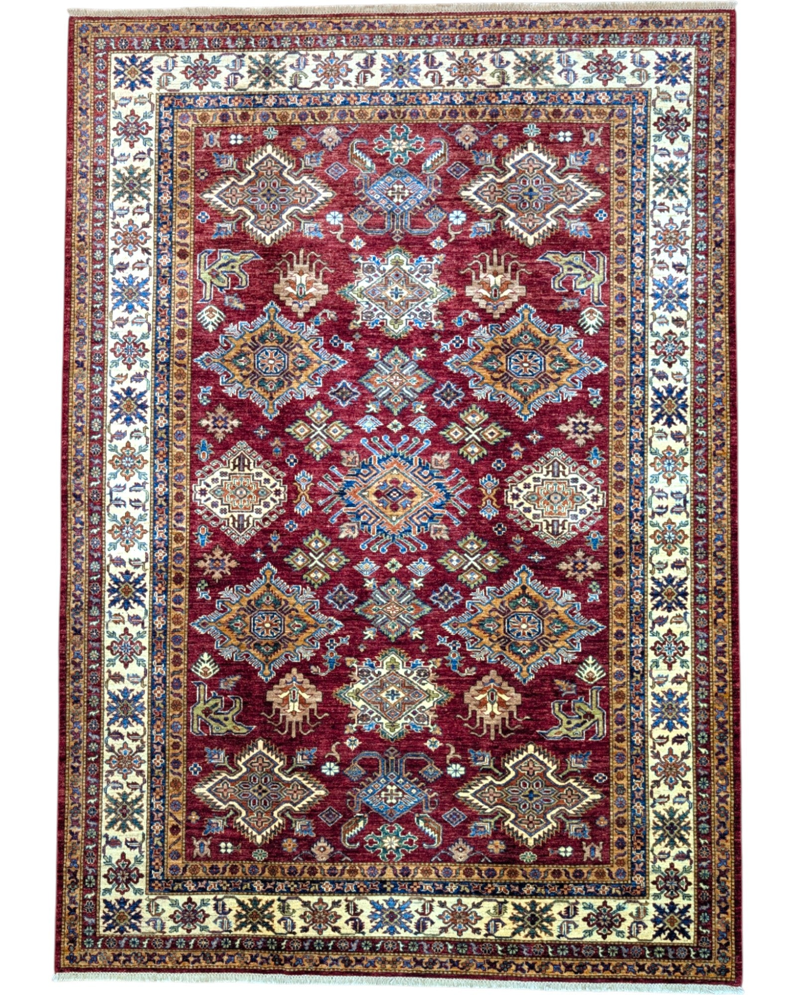 Tappeto Shirvan 295x207 cm con fondo bordeaux, motivi geometrici e floreali in avorio, blu e giallo, tramato ed annodato a mano, provenienza Caucaso.