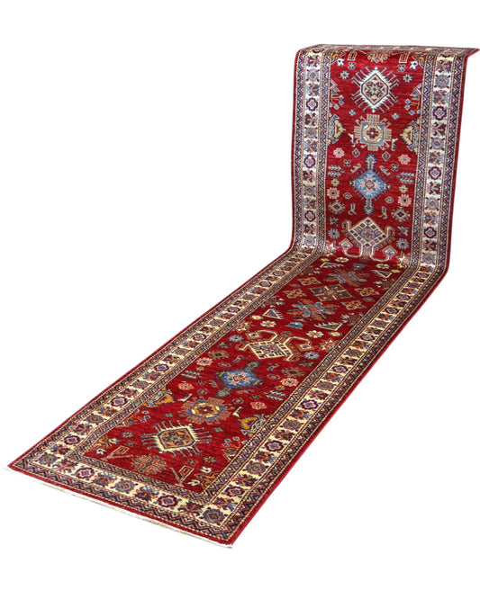 Passatoia Kazak afgana, fondo rosso con disegno geometrico, annodato a mano, 314x86 cm.