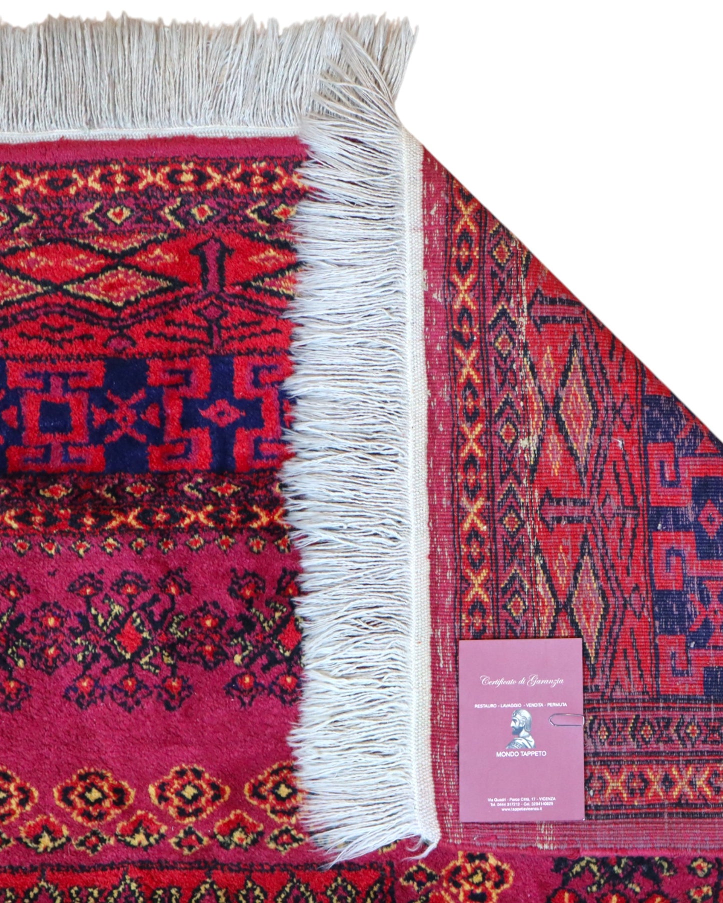 Tappeto Turkemen 278x185 cm con motivo geometrico ricco di rosa, blu e giallo, annodato a mano con lana di alta qualità e ordito in cotone resistente.