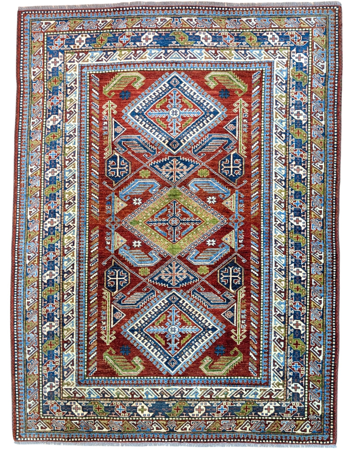 Tappeto Kazak afgano, fondo rosso con disegno geometrico, annodato a mano, 259x196 cm.