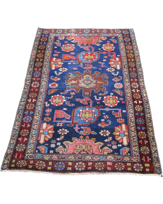 Tappeto persiano con sfondo blu e motivi colorati, dimensioni 150x90 cm