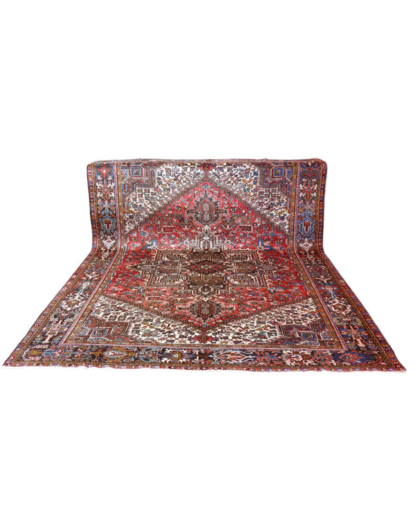 Tappeto Heriz persiano 347x255 cm, annodato a mano in lana e cotone, con medaglione geometrico e motivi floreali tradizionali.