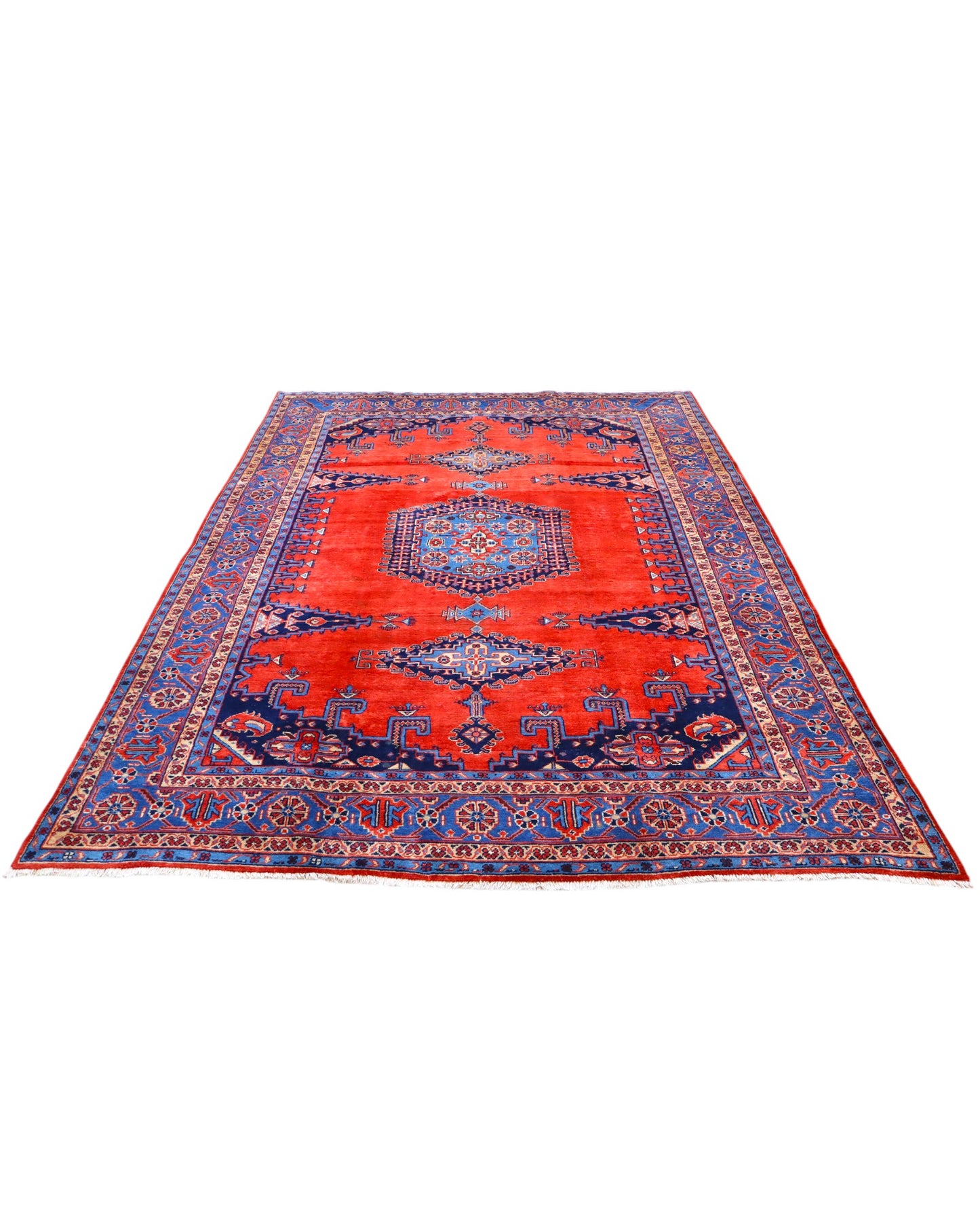 Tappeto Heriz persiano 339x219 cm, annodato a mano su telaio tradizionale, lana e cotone con colori vegetali, fondo rosso e dettagli blu.