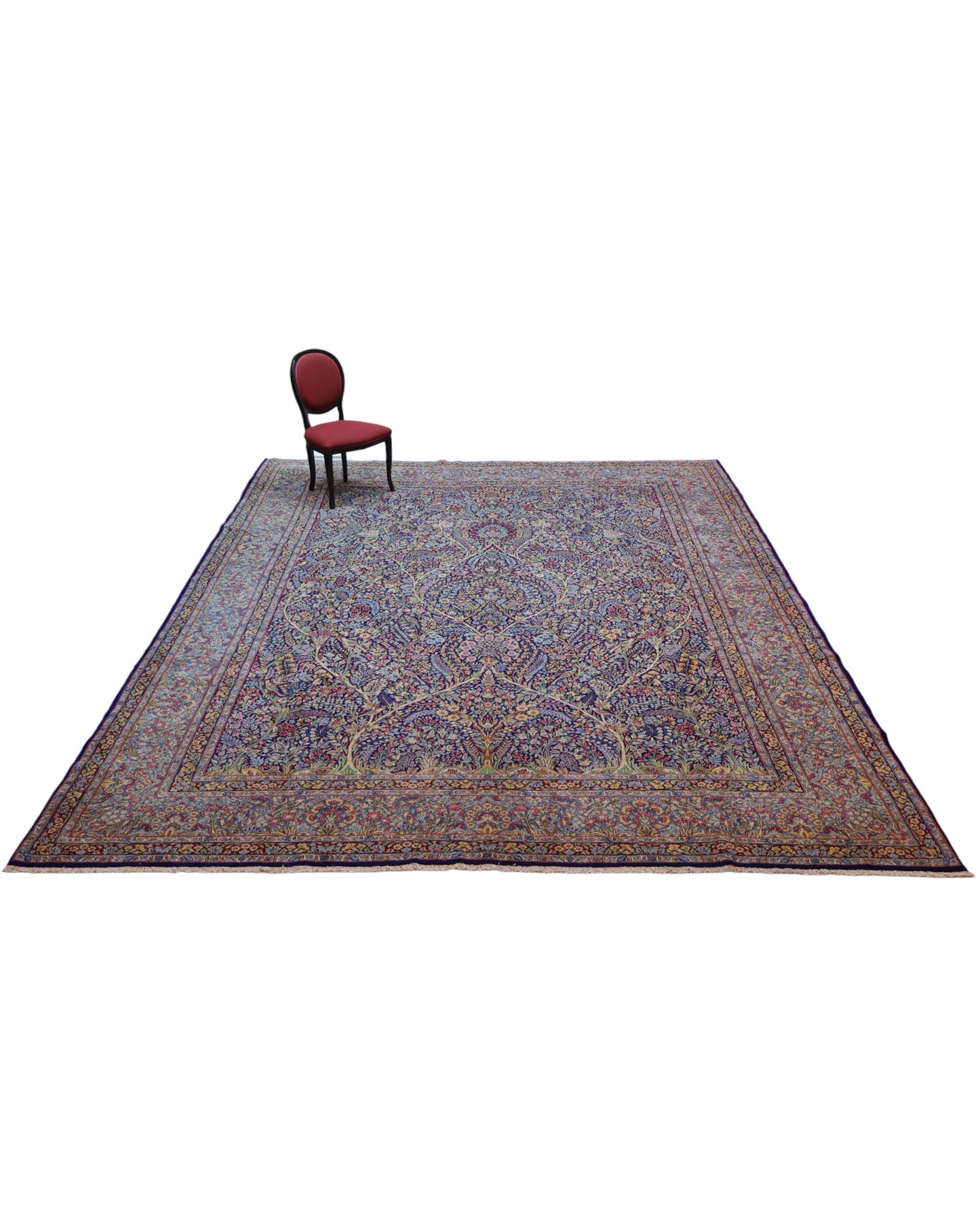 Tappeto Tabriz persiano 486x357 cm rettangolare, annodato a mano, con motivo floreale fitto multicolore su fondo azzurro e blu.