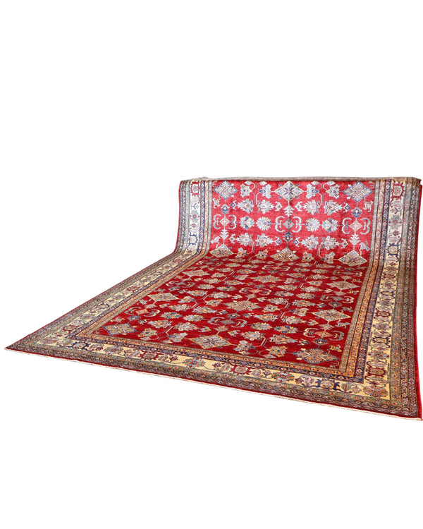 Tappeto Kazak 445x307 cm afghano, annodato a mano, con fondo rosso e motivi geometrici in azzurro, avorio e oro.