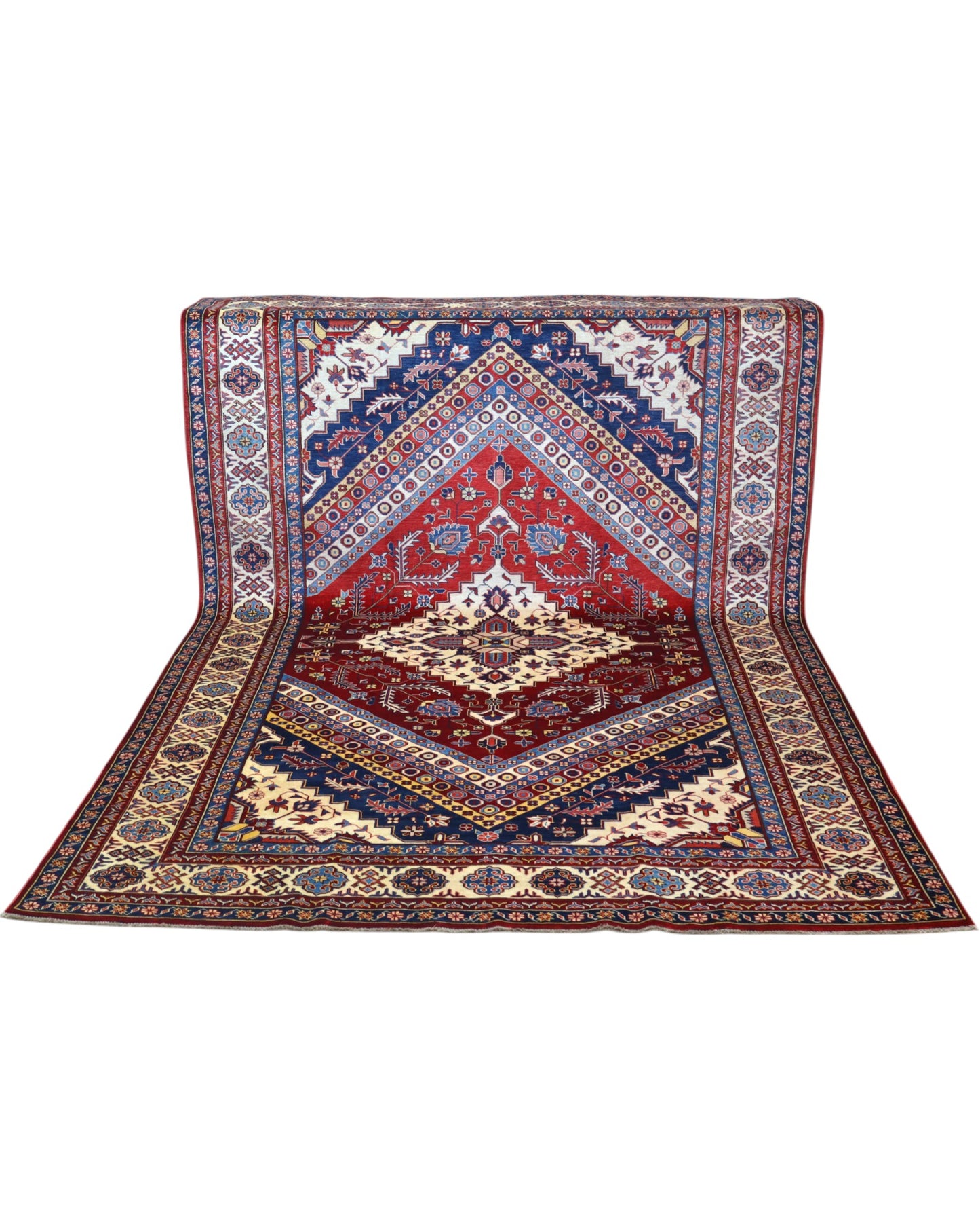 Tappeto Shirvan 274x184 cm con fondo rosso, medaglione centrale blu e avorio e bordure geometriche multicolori, tramato ed annodato a mano.