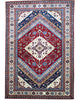 Tappeto Shirvan 274x184 cm con fondo rosso, medaglione centrale blu e avorio e bordure geometriche multicolori, tramato ed annodato a mano.
