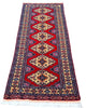 Tappeto Turkman persiano 192x70 cm, corridore con fondo rosso e rombi centrali avorio, annodato a mano in lana.