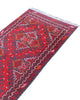 Tappeto Turkman 267x76 cm, corridore persiano in lana annodata a mano, fondo bordeaux con motivi geometrici rossi e arancio.