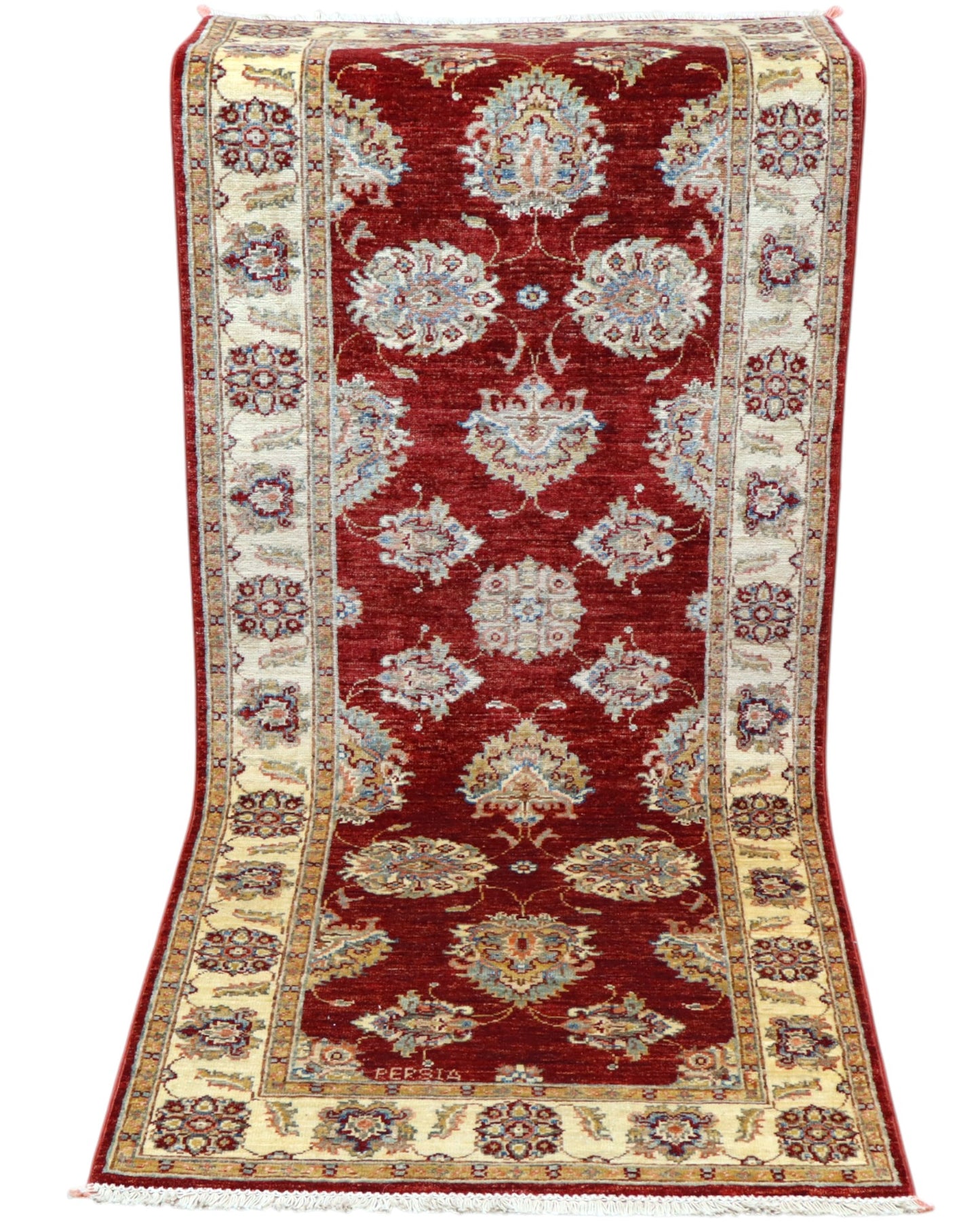 Tappeto Ziegler Afghan 199x83 cm annodato a mano, fondo rosso intenso con decorazioni floreali avorio e cornice chiara.