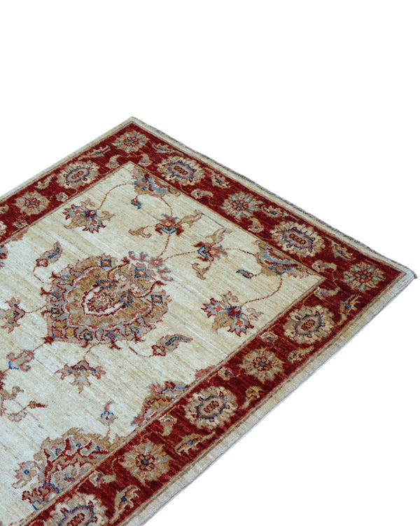 Tappeto Ziegler 190x80 cm fondo chiaro annodato a mano in lana e cotone.