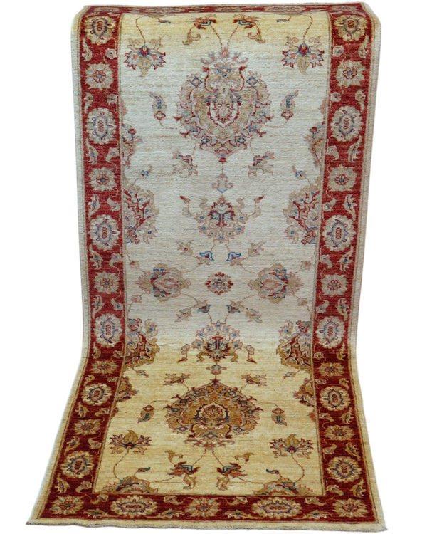 Tappeto Ziegler 190x80 cm fondo chiaro annodato a mano in lana e cotone.