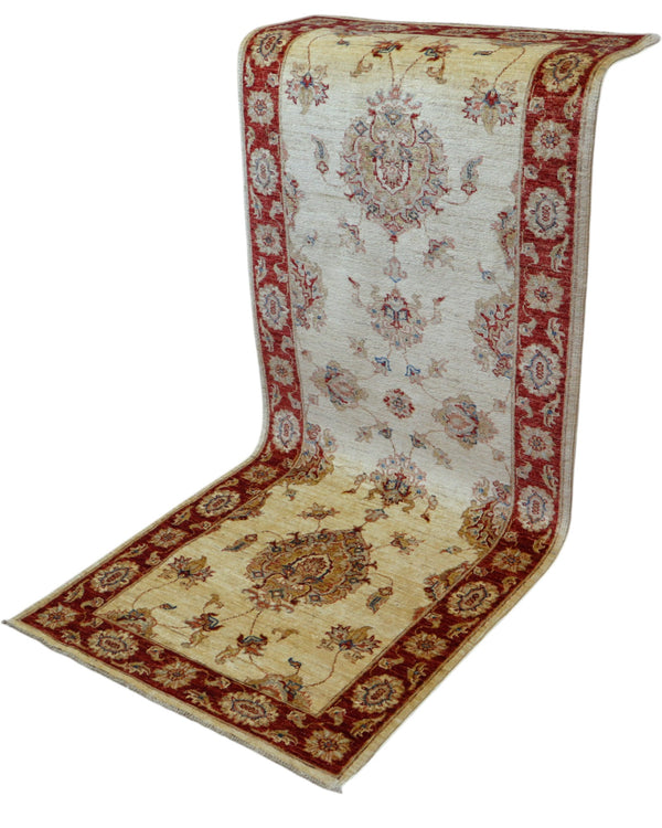 Tappeto Ziegler 190x80 cm fondo chiaro annodato a mano in lana e cotone.