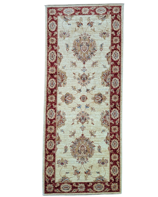 Tappeto Ziegler 190x80 cm fondo chiaro annodato a mano in lana e cotone.