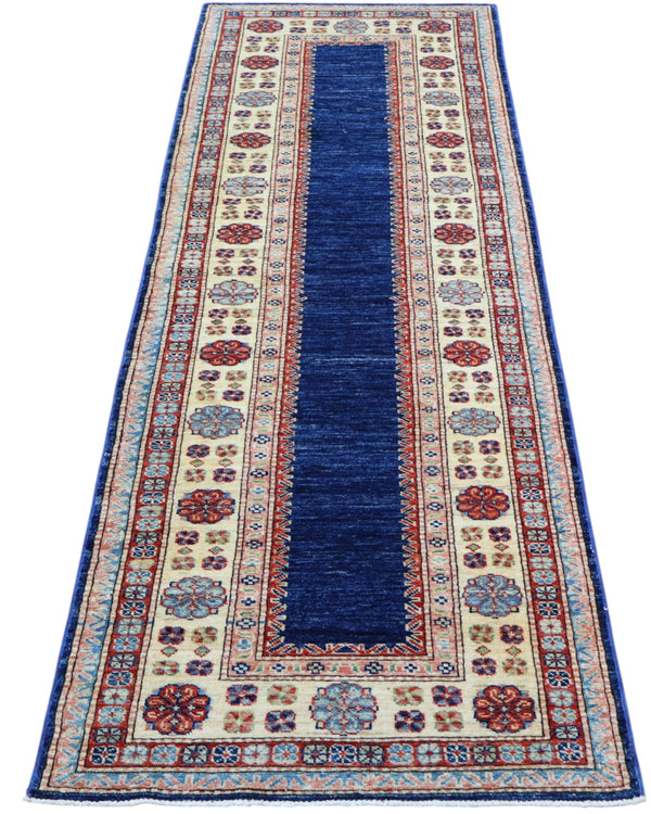 Tappeto Kazak 237x79 cm fondo blu annodato a mano in lana e cotone.