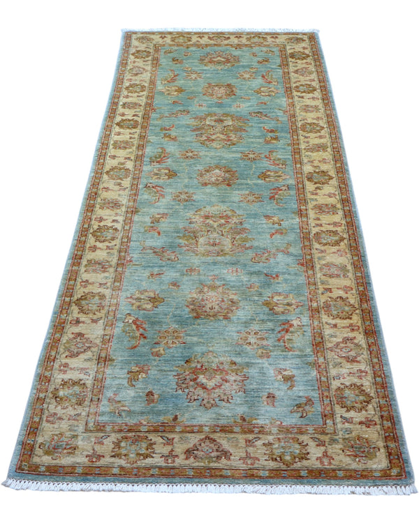 Tappeto Ziegler 257x77 cm, provenienza Afghanistan, fondo azzurro con motivi floreali beige e rosso mattone, corridore annodato a mano in lana vegetale.