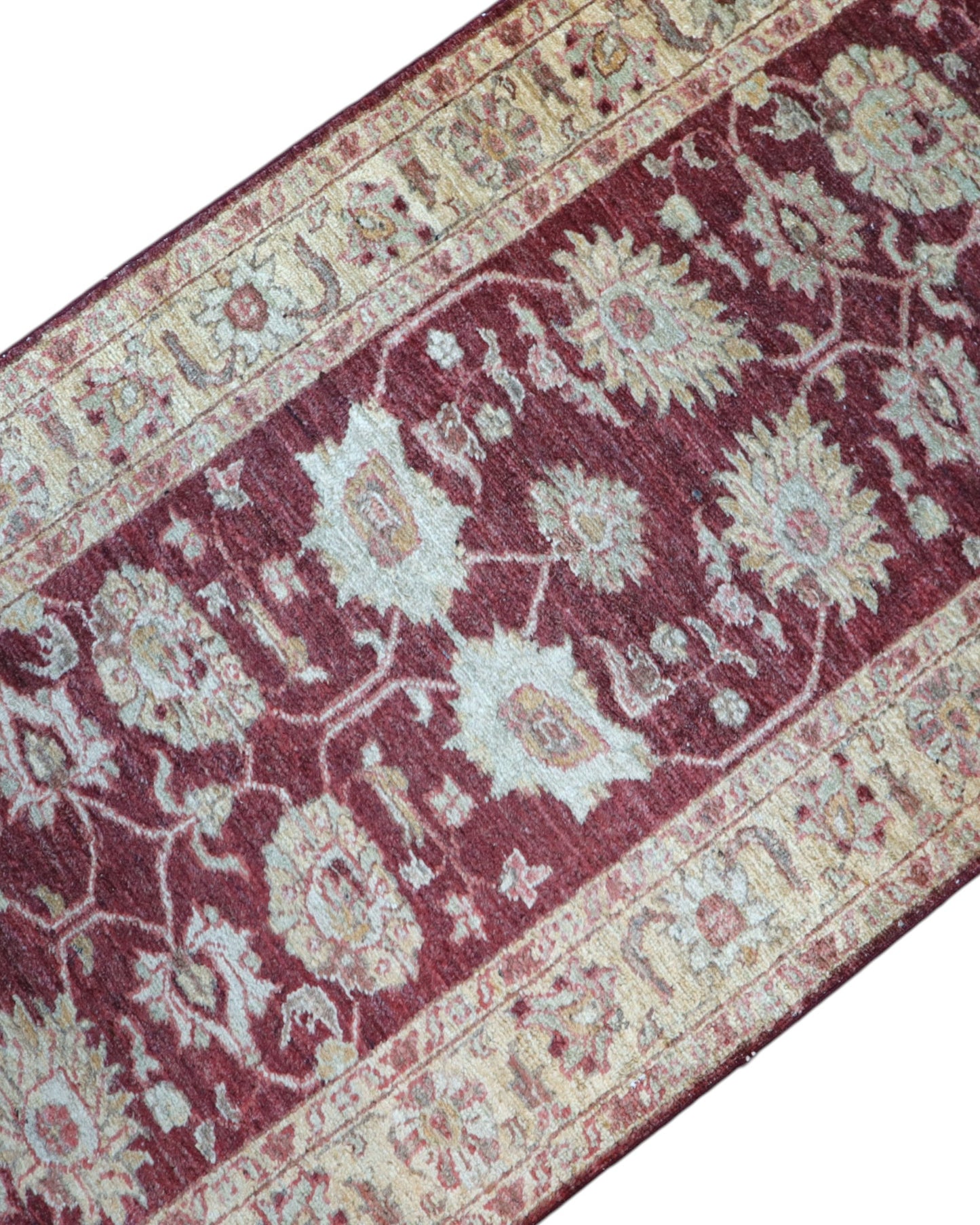 Tappeto Ziegler 261x78 cm, Afghanistan, corridore con fondo rosso borgogna e motivi floreali beige e avorio, annodato a mano in lana vegetale.