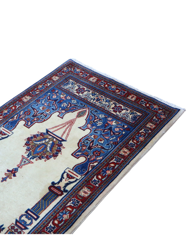 Tappeto Sarough persiano 205x82 cm, corridore con fondo avorio e motivi floreali in blu e rosso, annodato a mano in lana vegetale.