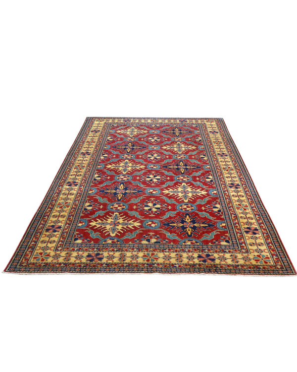 Tappeto Shirvan 289x196 cm con fondo rosso e motivi geometrici gialli, blu e avorio, tramato ed annodato a mano, provenienza Caucaso.