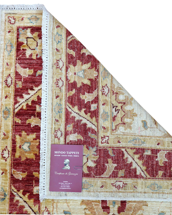 Tappeto Ziegler 210x81 cm afghano annodato a mano, corridore in lana con fondo chiaro e decorazioni floreali rosse.