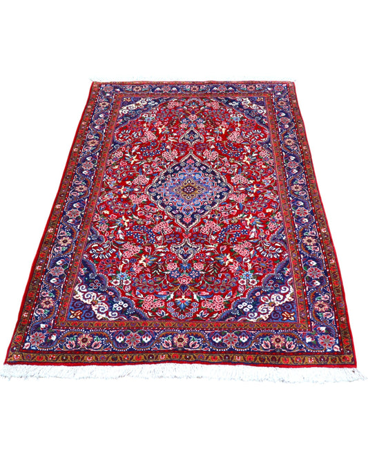 Tappeto Jozan rosso 163x106 cm con motivi floreali in salotto raffinato