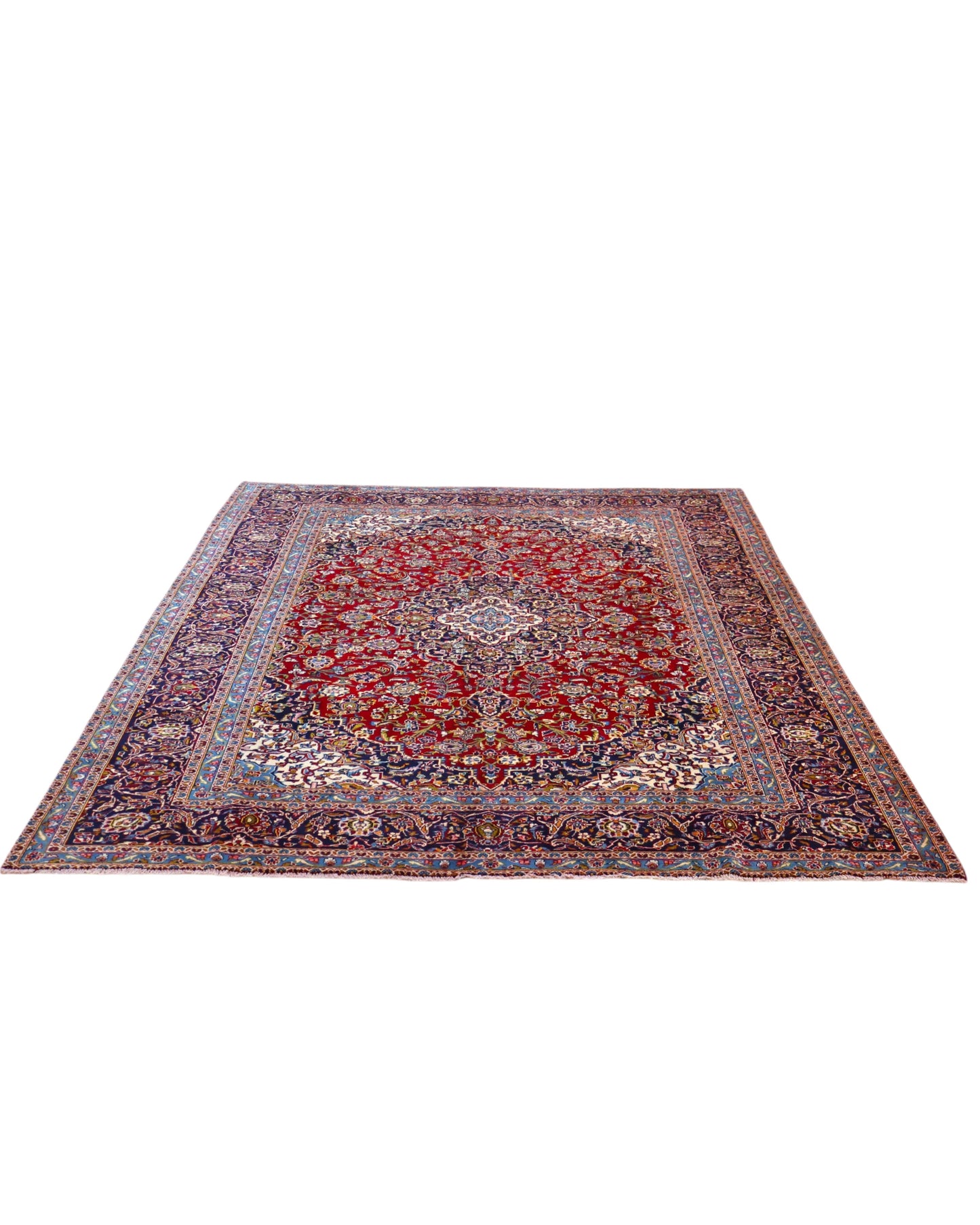 Tappeto persiano Kashan 400x300 cm, fondo rosso con medaglione centrale e cornice floreale, annodato a mano in lana vegetale.