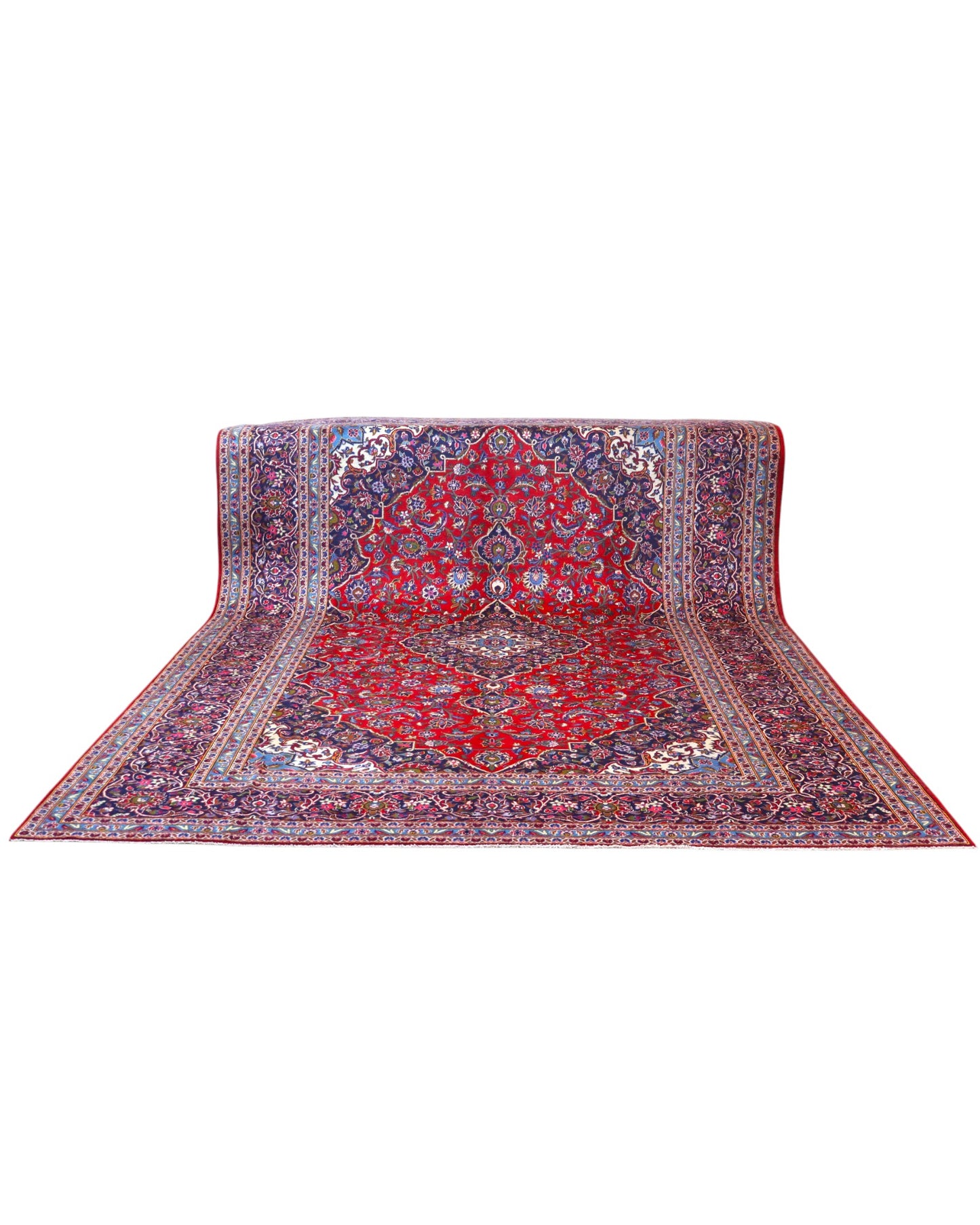 Tappeto persiano Kashan 402x297 cm, fondo rosso con medaglione centrale blu e avorio, annodato a mano in lana vegetale.