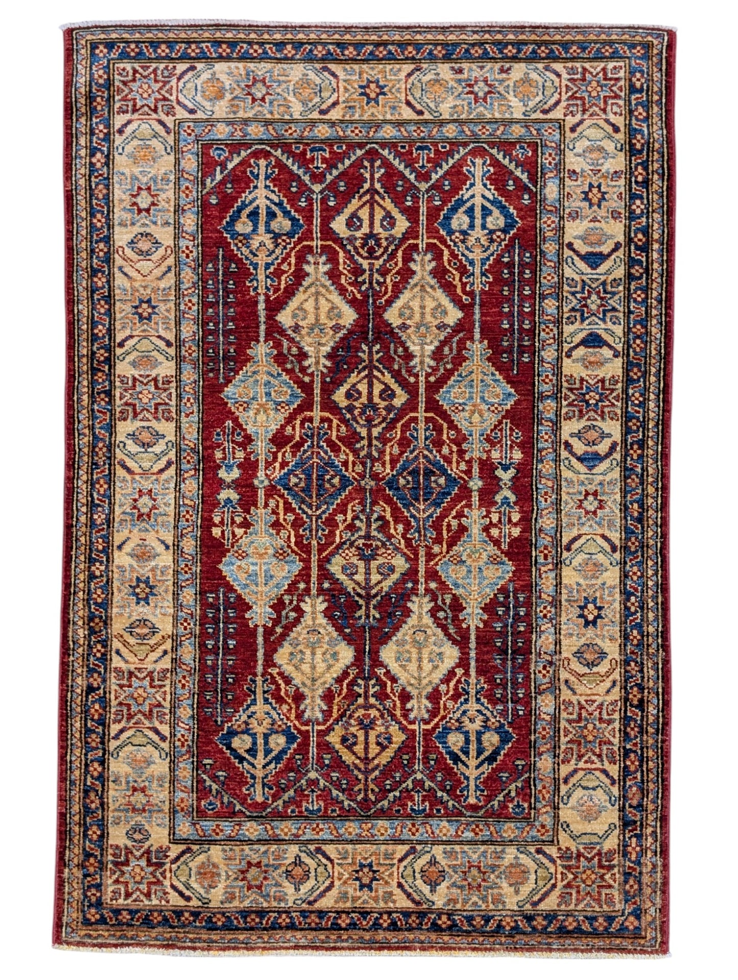 Tappeto Shirvan 154x102 cm, annodato a mano in Persia, fondo rosso con motivi geometrici blu, giallo e beige, lana pregiata e cotone resistente, certificato di autenticità incluso.