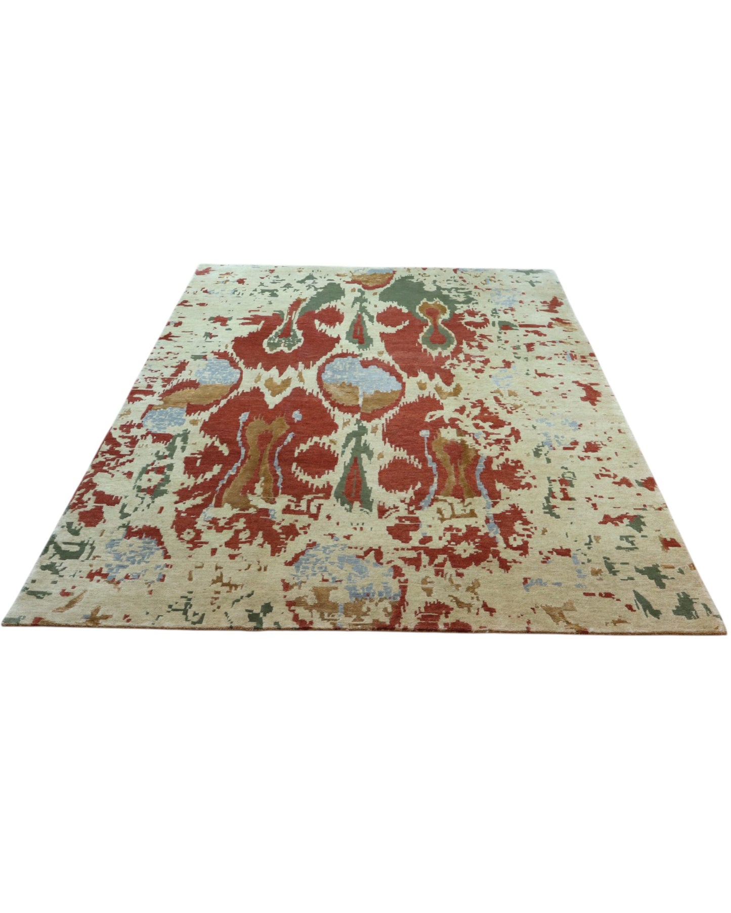 Tappeto Moderno persiano 270x184 cm con fondo verde chiaro e motivi ikat in rosso, blu e verde scuro, tramato ed annodato a mano.