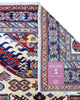 Tappeto Shirvan Afghan 157x121 cm con fondo avorio, motivi geometrici blu e rossi, tramato ed annodato a mano, provenienza Afghanistan.