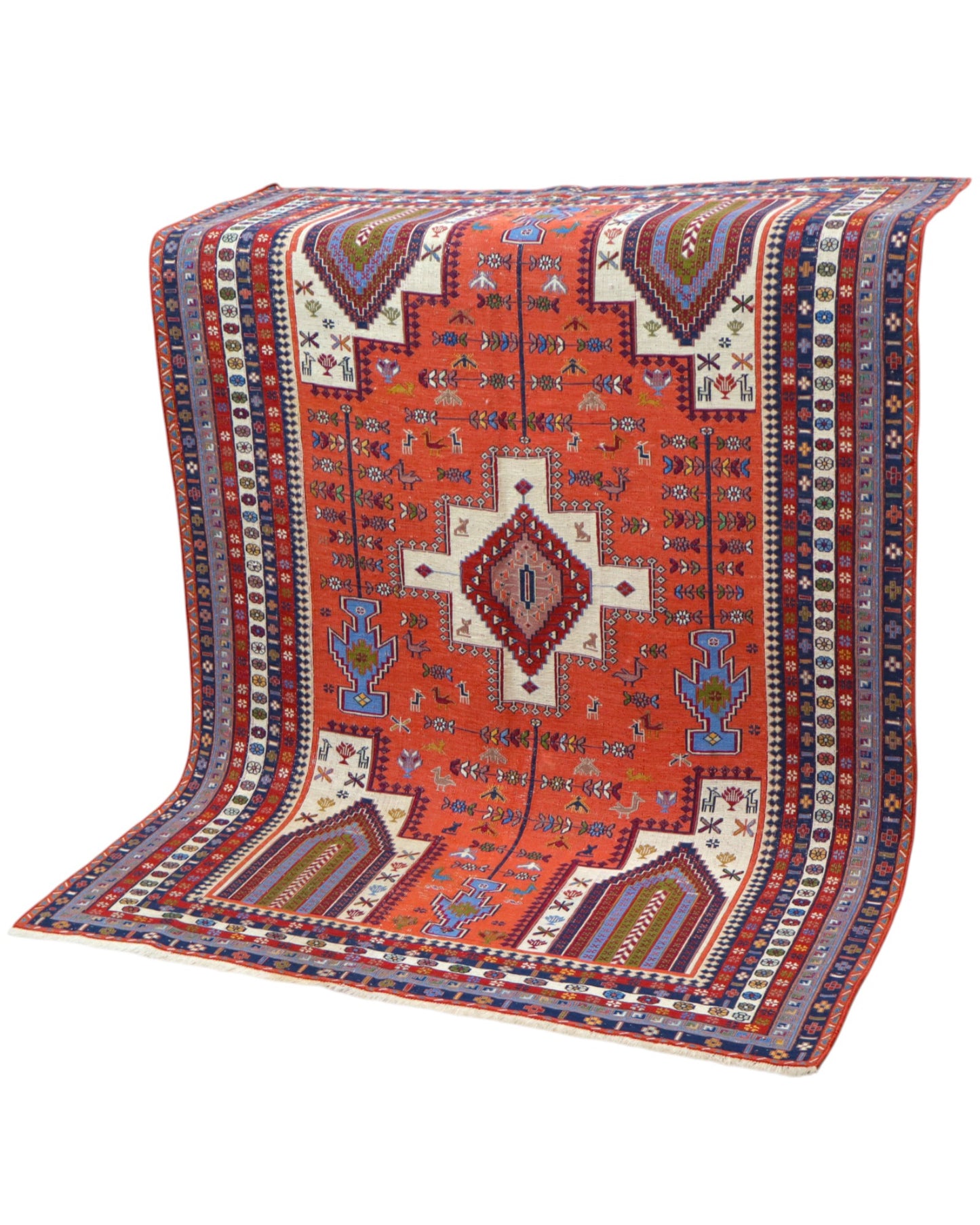 Tappeto Kilim 180x125 cm persiano tessuto a mano, con motivi geometrici tribali e medaglione centrale su fondo rosso mattone.