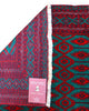 Tappeto Bukhara 172x126 cm annodato a mano, con motivi geometrici gul su fondo verde smeraldo e cornice rossa.