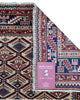 Tappeto Shirvan 167x122 cm in lana annodata a mano, fondo chiaro con rombi geometrici e cornice caucasica.