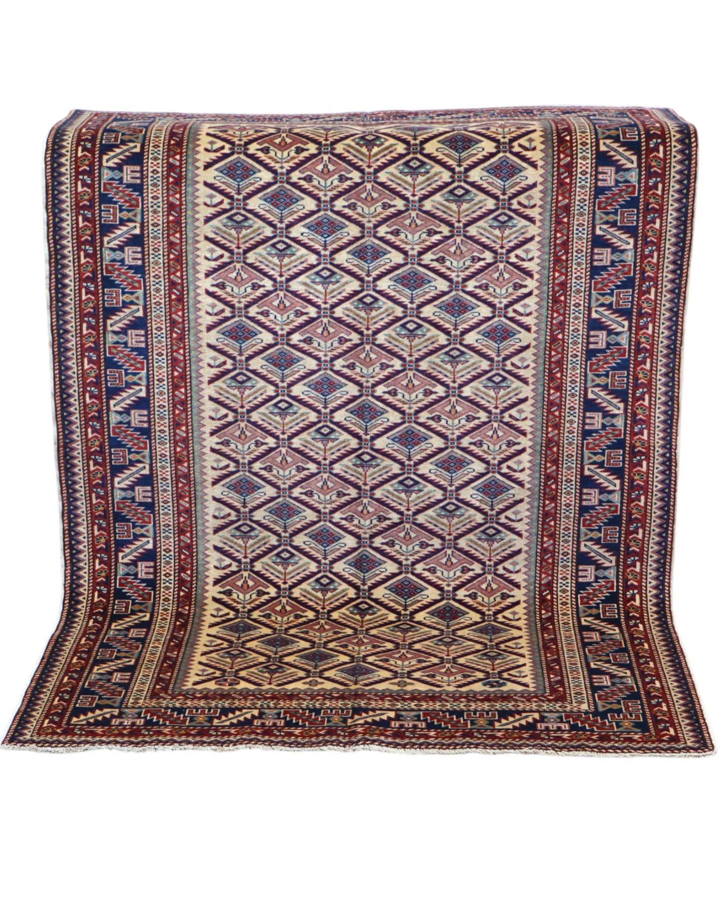 Tappeto Shirvan 167x122 cm in lana annodata a mano, fondo chiaro con rombi geometrici e cornice caucasica.