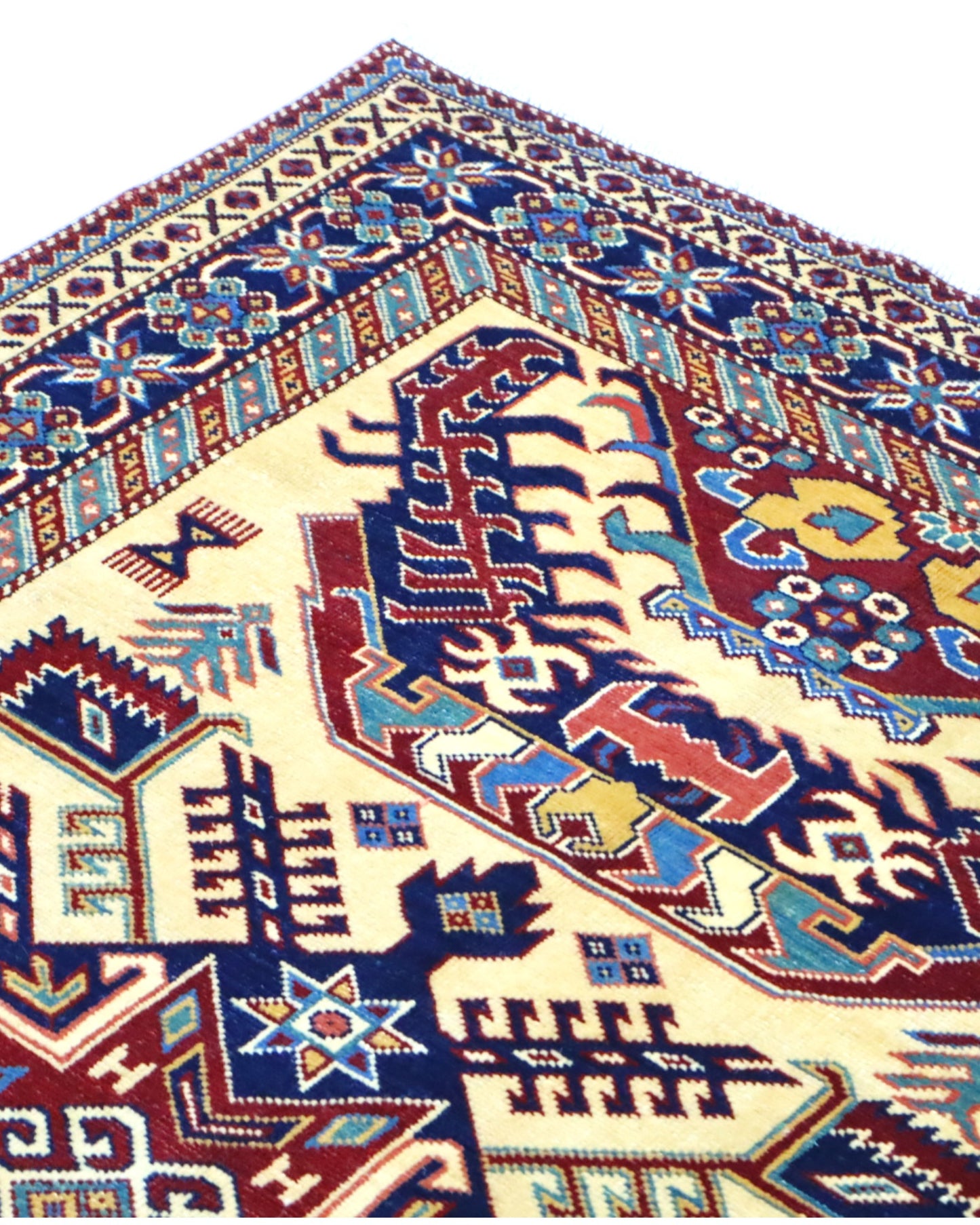 Tappeto Shirvan Afghan 164x117 cm, annodato a mano, con campo avorio, medaglione geometrico centrale e bordo decorato.